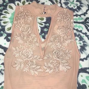 Pink mesh bodysuit with floral beading detail!